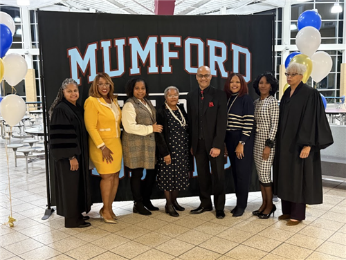 Judge Alicia Jones Coleman swears in Board of Education Incumbent Sherry Gay-Dagnogo at Mumford High School on Dec. 4, 2024